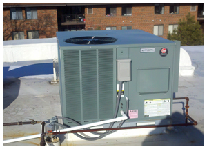 Apartment building air conditioning unit installation on rooftop